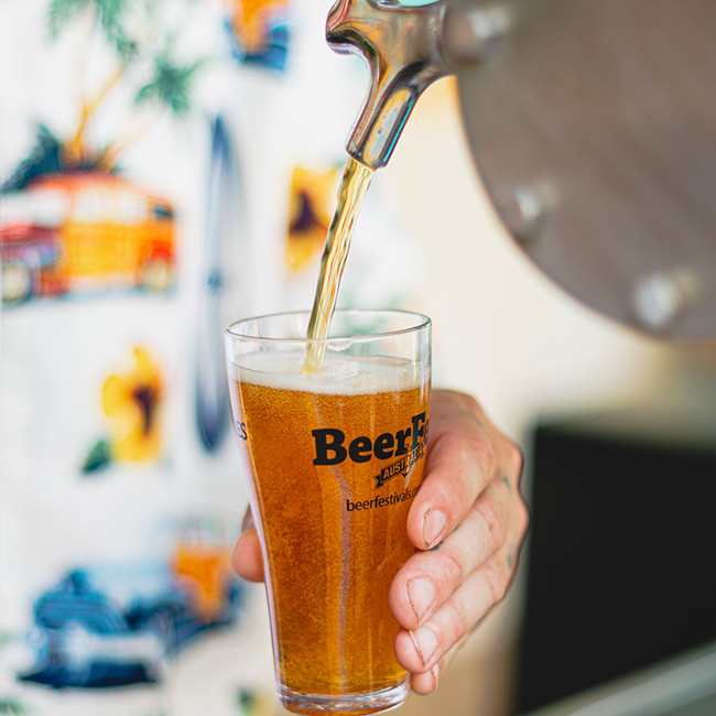 Beer being poured into a BeerFest cup