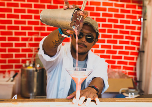 Freshly made cocktail being served